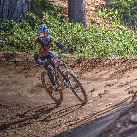 Emi cornering a forest berm