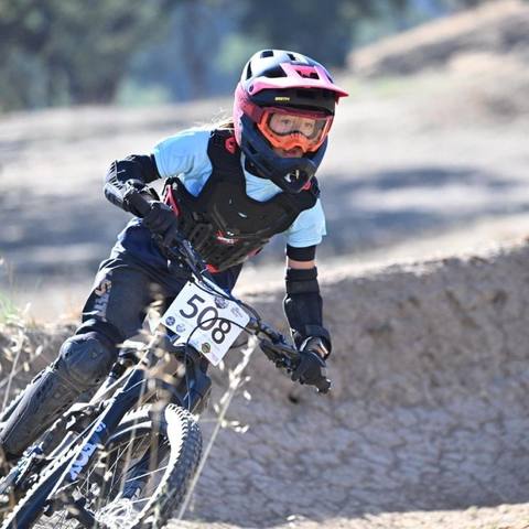 Emi cornering in a dual slalom berm
